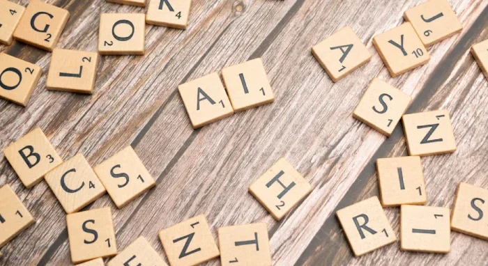 scrabble-tiles-on-a-wooden-table-with-the-word-rock